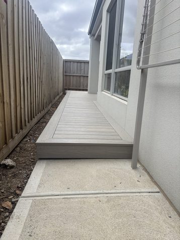 A long composite run down the side of a house